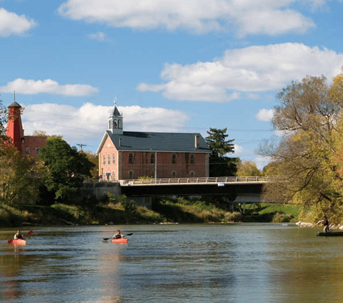 the historic Town Hall and the Saugeen River in Paisley, Ontario